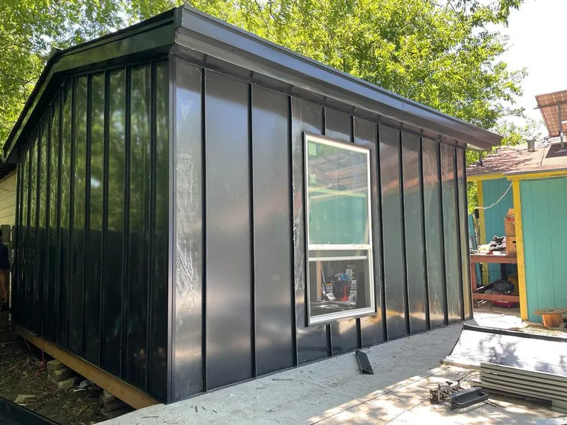 Black standing seam metal wall panels for Metal Roof Installation in Cheltenham